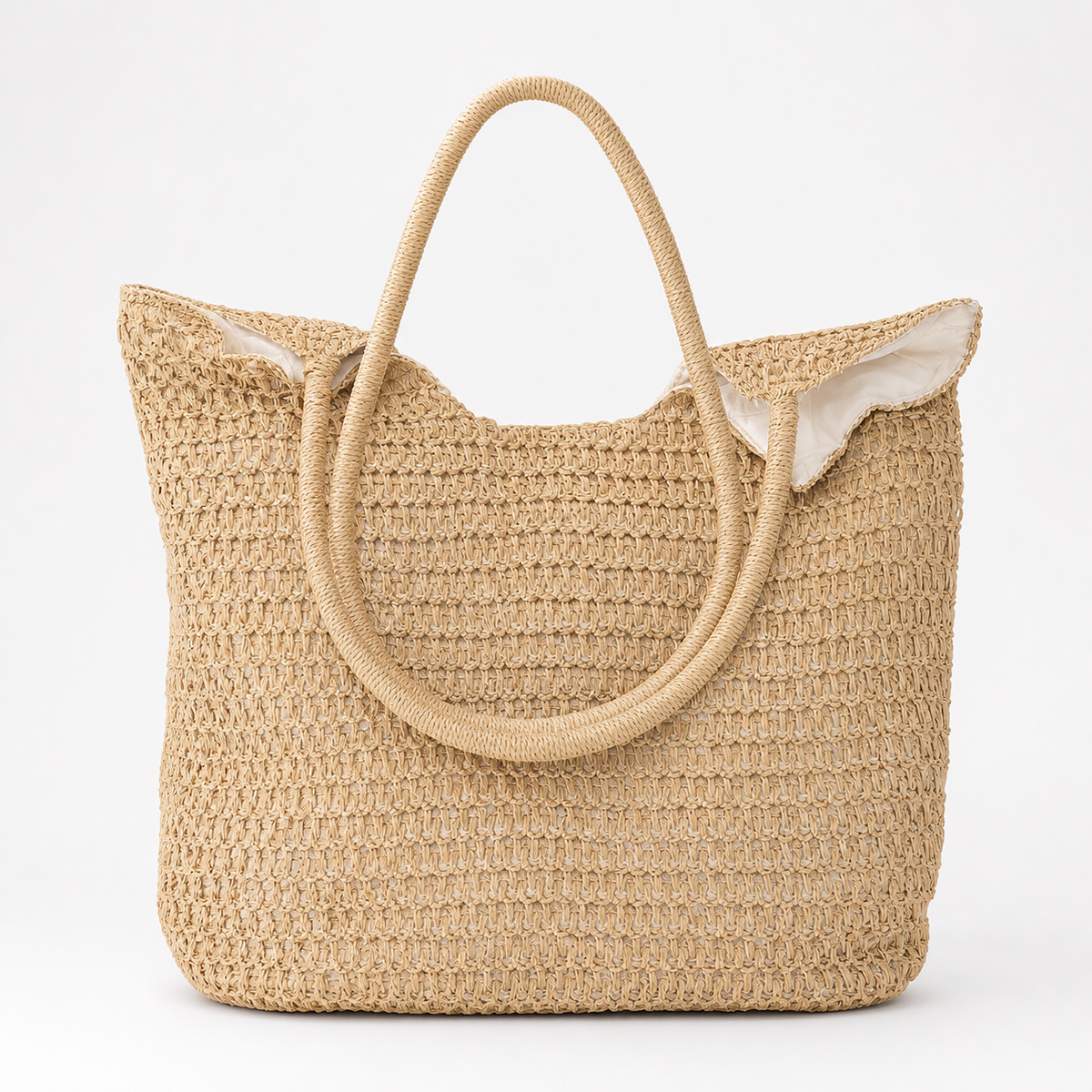 Natural beige open-weave tote bag with wrapped rope-style handles and light fabric lining