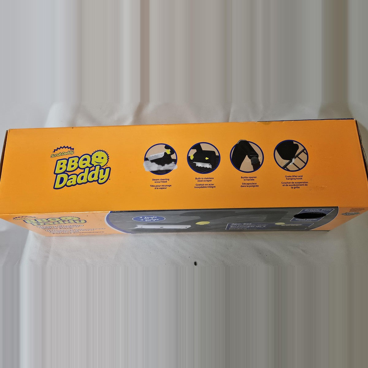 Scrub Daddy BBQ Daddy box top showing 4-in-1 features