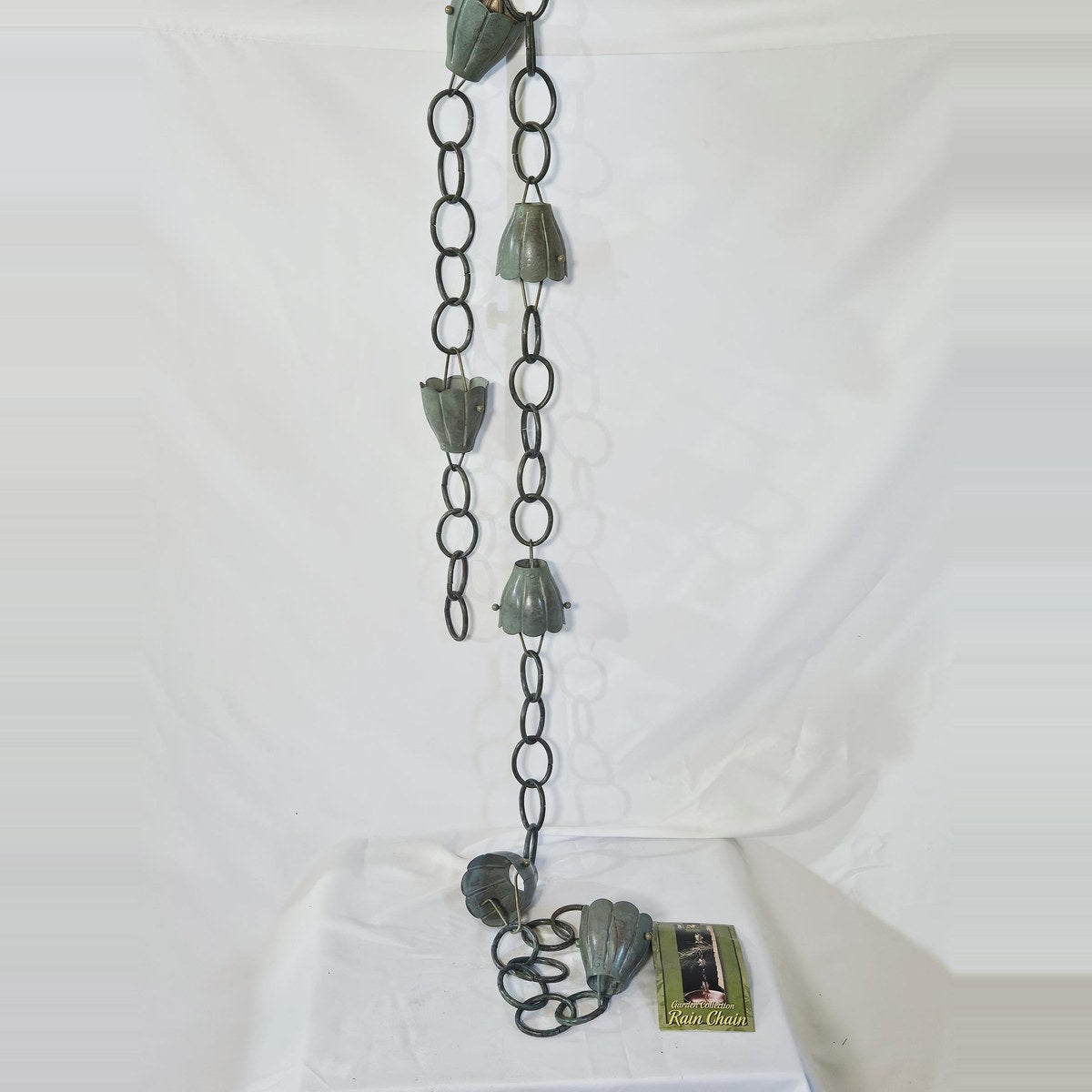 Good Directions verdigris rain chain with bell cups