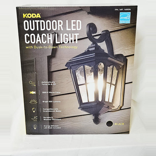 Koda outdoor LED coach light with dusk-to-dawn sensor, box front