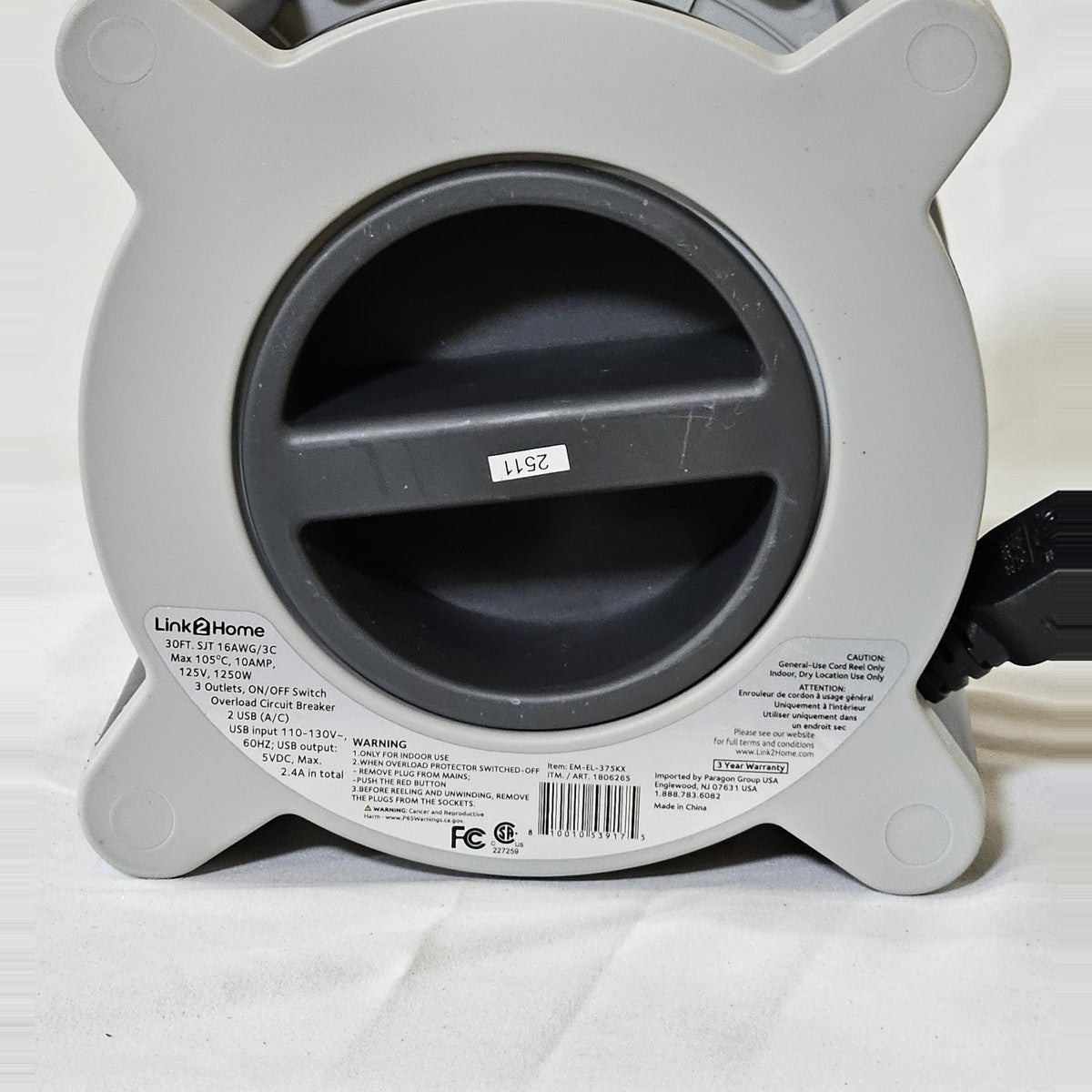 Link2Home cord reel back with winding handle and specifications label