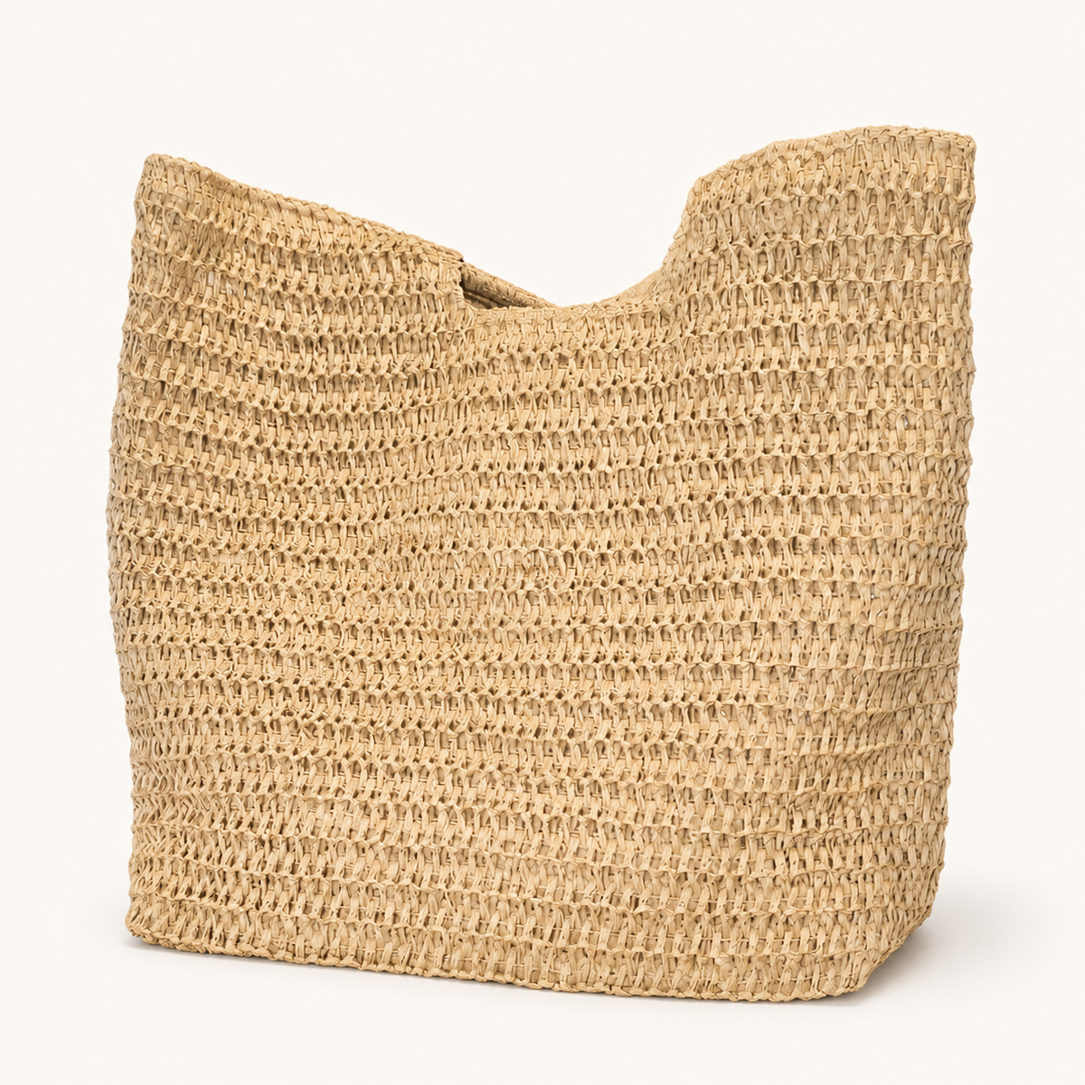 Natural beige open-weave tote bag with integrated upper handles