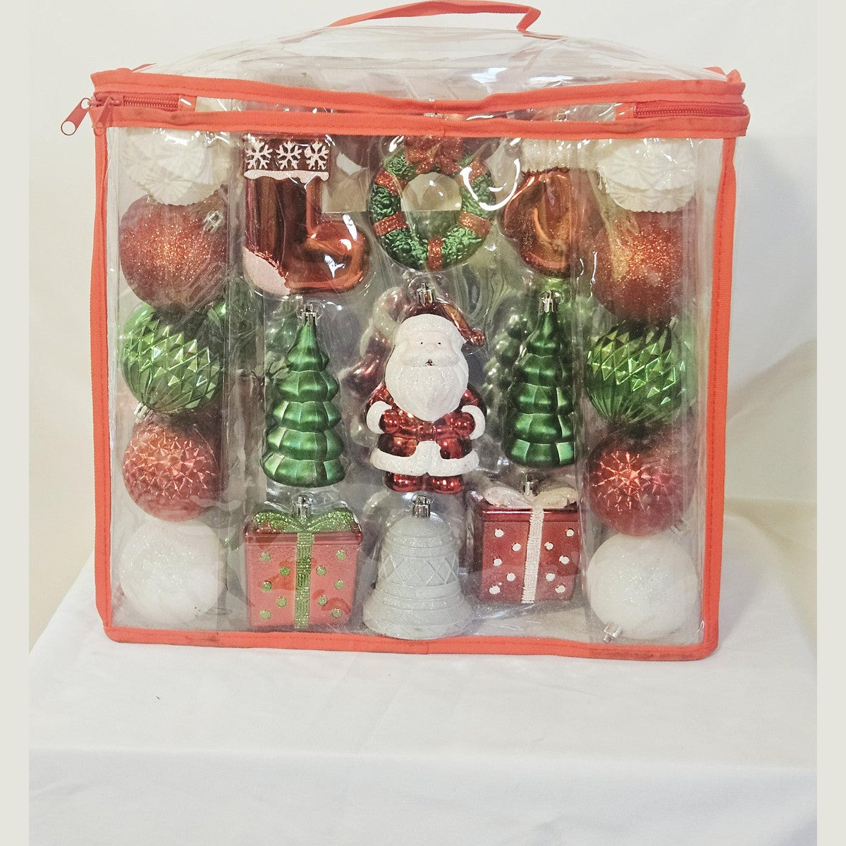 Holiday Living 72 count ornament set red green white, back view with Santa and trees